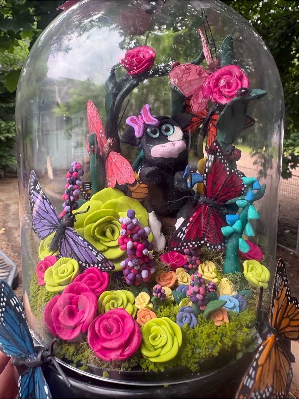 Whimsical Cow in Garden Dome with Colorful Flowers & Butterflies